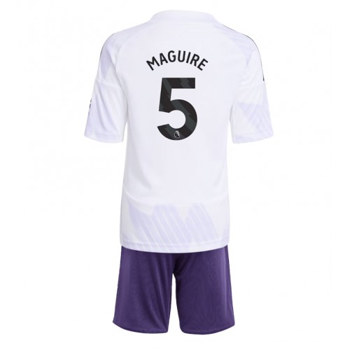 Stroje piłkarskie Manchester United Harry Maguire #5 Koszulka Wyjazdowej dla dzieci 2025-26 Krótki Rękaw (+ szorty)